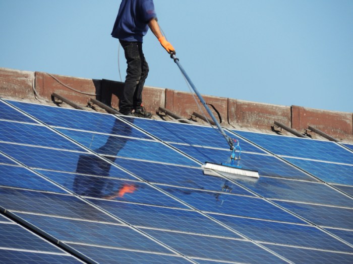 How to Maintain Solar Panels:Dip the brush into the soap and water mixture and gently rub it over the solar panels
